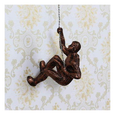 eCraftIndia Brown Resin Climbing Man Statue Wall Hanging