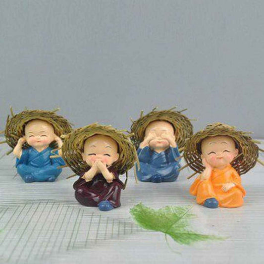 LX INDIA Buddha Monk eCraftIndia Set of 4 Resin Buddha Monk Statue with Hat