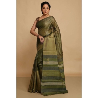 Model wearing green pure Kosa Tussar silk saree handcrafted by Chhattisgarh artisans with blouse piece