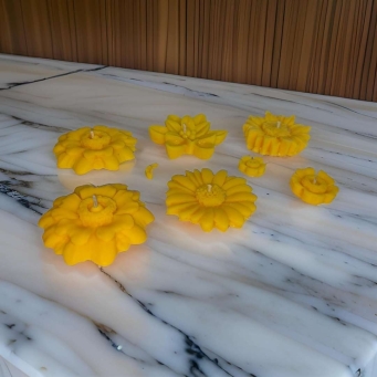 SS Enterprise yellow floating candle made from soy wax