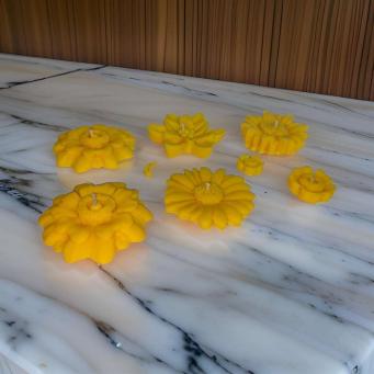 SS Enterprise yellow floating candle made from soy wax