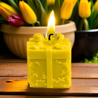 Front view of SS Enterprise Organic Soy Wax Gift Shape Candle in Yellow