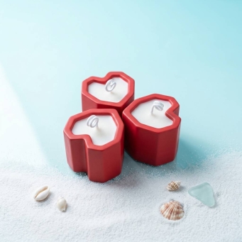 Front view of Sugandhit Red Heart Candle Set of 3 with floral fragrance