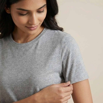 Women  grey solid round neck t shirt close-up view