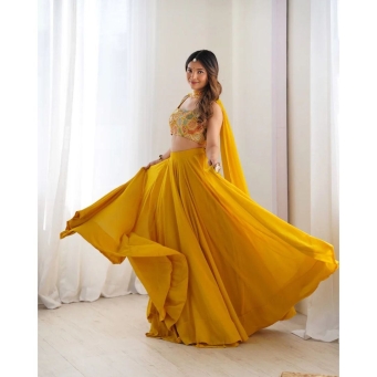 Mustard yellow flared lehenga choli with embroidered dupatta
