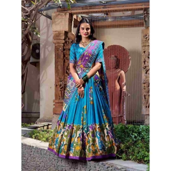 Firozi tusser silk lehenga choli with floral print and foil work dupatta for festive occasions
