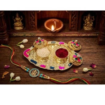 gold pink blue kankavati kumkum plate with traditional embossed design for pooja