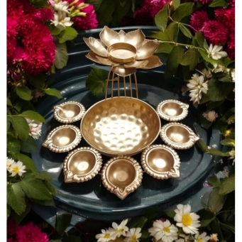 Rose gold lotus urli bowl with floating flower space