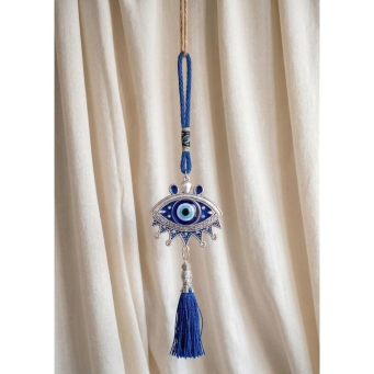 Blue evil eye hanging nazar battu talisman with decorative tassel