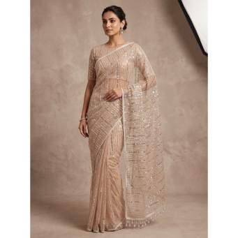 Cream soft net saree with heavy work blouse