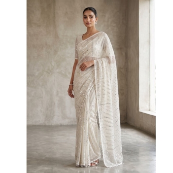 Cream soft net saree with heavy work blouse