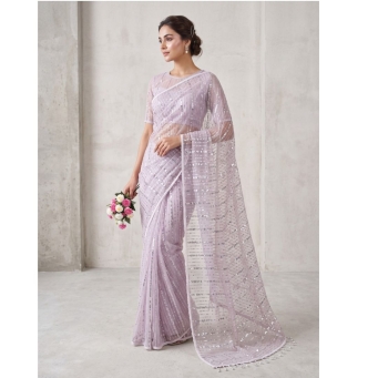 Women's soft net saree with bead embellishments and heavy work blouse