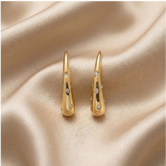 Stellar gilded drop earrings with crystal accents